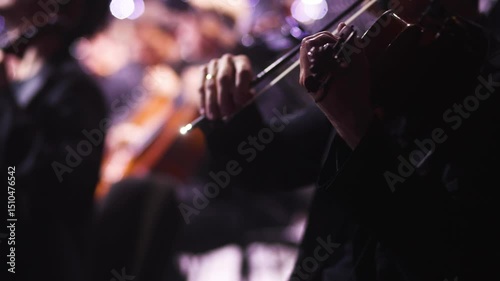 Concert view of violinist with vocalist and musical band, fiddler performing classical music, symphony orchestra performing music, violin player on stage in a club, music arena hall, fiddle and bow