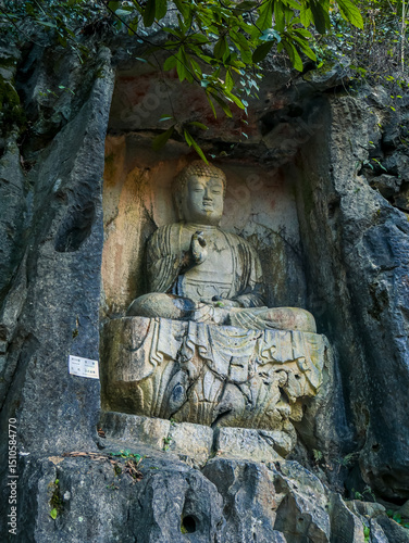 Rock caving scultors at Feilai Feng mountian in Lingyin Temple,One of the largest Buddhist temples in Hangzhou city of China photo