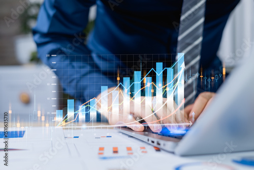 Businessman analyzes digital online marketing growth graph, referring to sales data on modern interface icons of strategy for content development on global network connection.