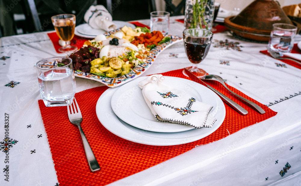 Fototapeta premium Moroccan Poolside Dining Setup with Traditional Tagine and Decor May 29,2025 