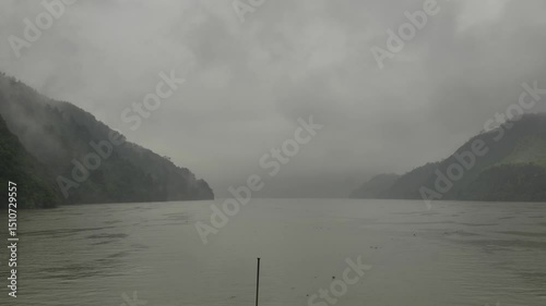 The natural scenery and various boats on the Fuchun River in Tonglu, Hangzhou, Zhejiang, China. High quality 4k footage