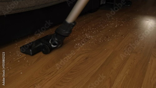 Effective cleaning of laminate flooring in an apartment with a vacuum cleaner.