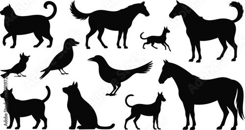 A collection of animal silhouettes including cats dogs horses and birds on a white background surface