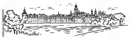 old european town panorama with river and trees
