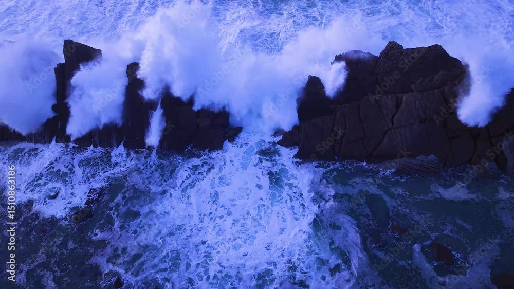Aerial view of the sunset lights on the cliffs of Madero Beach in the Dunes of Liencres Natural Park. Piélagos Municipality, Costa Quebrada Geopark, Cantabrian Sea, Cantabria, Spain, Europe