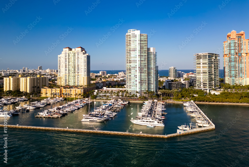 Fototapeta premium Aerial view of Miami skyline. Drone shot of Miami cityscape. Top view of South Miami and the ocean. Miami skyline.