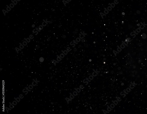 Abstract dust particles on black background