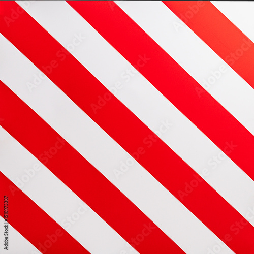 Free Download Red and white striped road sign indicating oversized cargo restrictions on highways in a rural area - GFXLoad