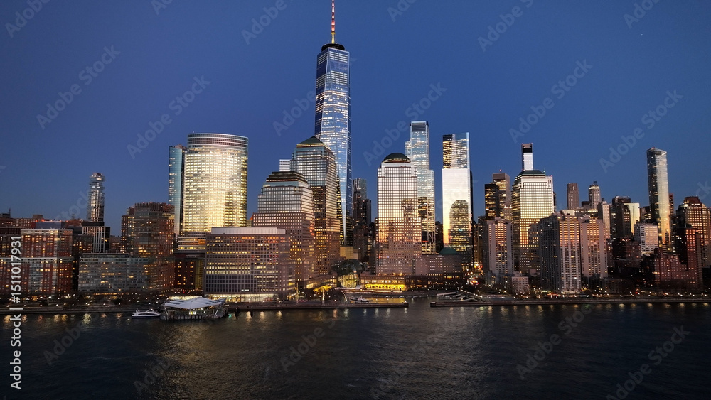 Obraz premium Sunset Skyline In New York Skyline At Manhattan In New York United States. Sunset Landscape. Financial District. New York Skyline At New York United States. Highrise Buildings Scenery. 