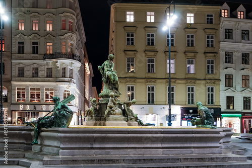 View of the Donnerbrunnen, a Baroque fountain located on Neuer Markt square, Austria