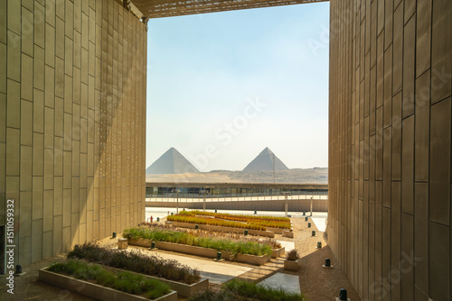 View of Giza Pyramids from the interior of the Grand Egyptian Museum (GEM), Cairo, Egypt, Africa