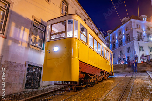 View of vintage Gloria Funicular at dusk, hilltop tram ride, Lisbon, Portugal, Europe