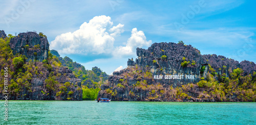 Boat ride along the karst rock formations of the Kilim Langkawi UNESCO Geoforest Park, Langkawi, Kedah, Malaysia