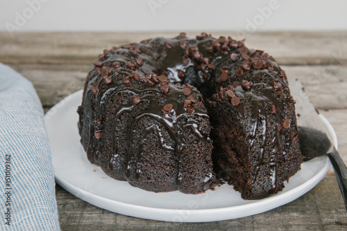 Chocolate bundt cake with chocolate glaze and chips  photo