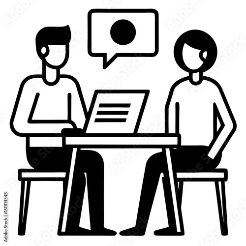 Two people sitting at a table having a conversation with a laptop