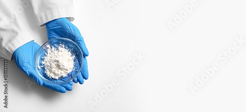 Scientist's hands holding P...