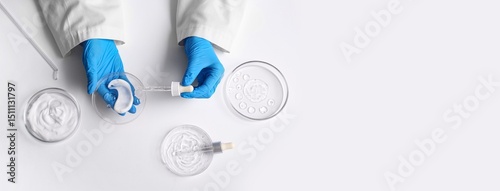 Scientist's hands using gla...