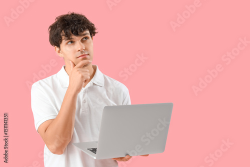 Thoughtful male programmer ...