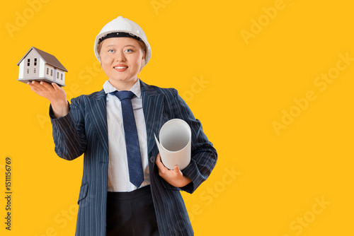 Young female architect with...