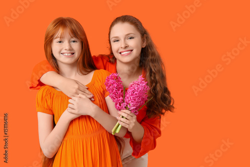 Young ginger woman and her ...