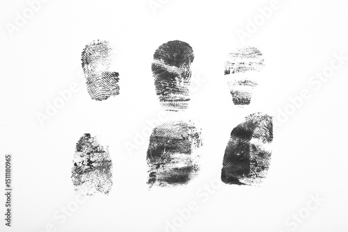 Black finger prints on whit...