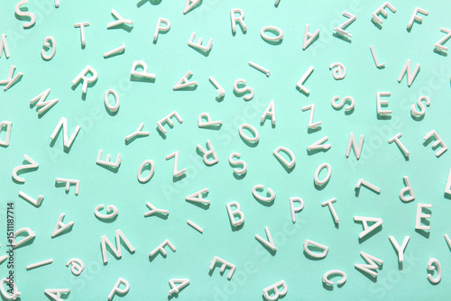 English letters on turquoise background