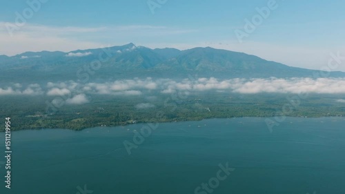 Wallpaper Mural Tropical Island with blue sea and cloudscape over the mountain. Lanao del Norte. Mindanao, Philippines. Torontodigital.ca