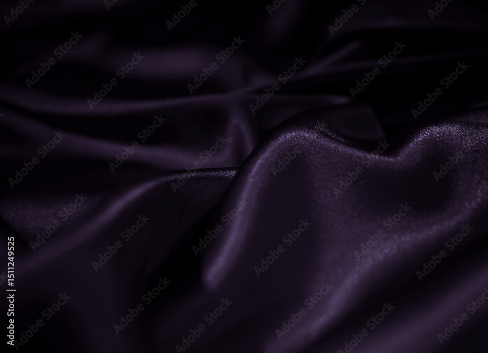 Obraz premium Luxury silk satin fabric background. Fashion elegant dark shade of purple and black. Waves and folds on the lined material. Violet, true purple, blackberry, wine, indigo, grape, eggplant, midnight