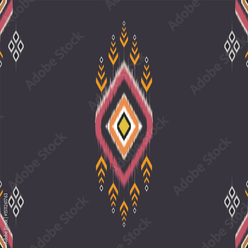 Abstract ikat pattern geometric diamond shapes and abstract floral motifs