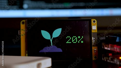 Soil moisture display screen with IoT microcontroller operation, Smart farm agriculture
