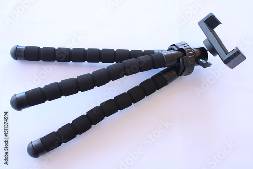 Fotografie Flexible black octopus tripod with bendable legs