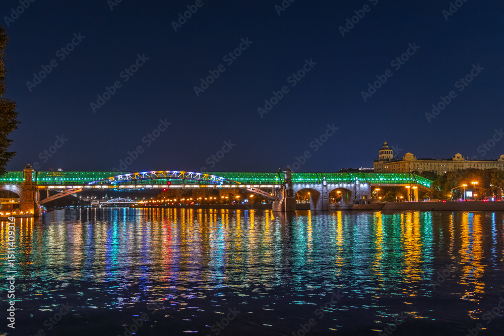 Fototapeta premium Pushkinskiy bridge with night illumination. Bridge to Gorky Park.