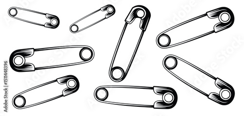 Multiple Safety Pins Scattered on White Background