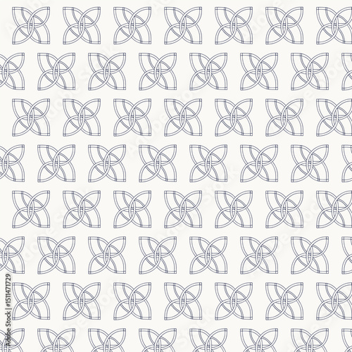 A repeating pattern of intricate Celtic knotwork designs.