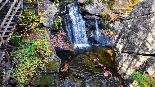 Scenic water falls at Lost River Gorge and Boulder Caves during autumn time. photo