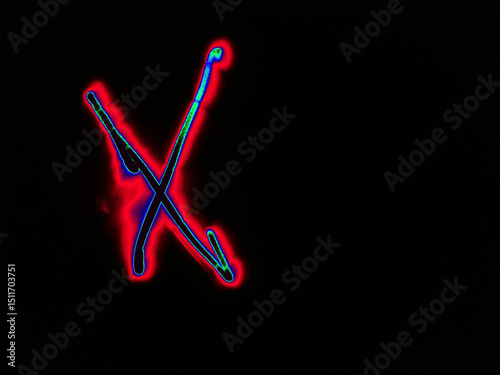 Glowing English letter X. On a black background with colored neon lines, a letter of the English alphabet is written by hand. The letter glows pink-red, creating a green-blue halo around it.