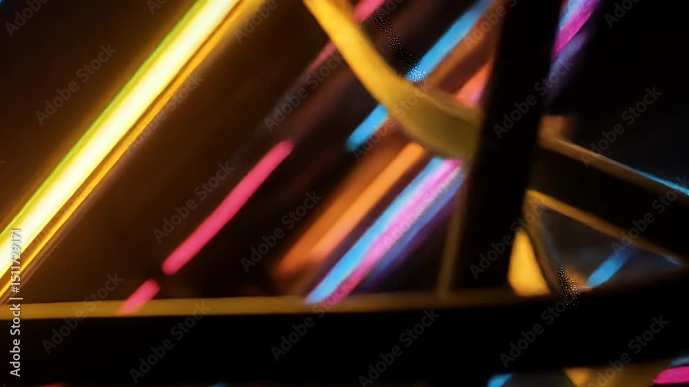 Abstract Multi Colored Neon Light Installation with Diagonal Stripes in a Dark Environment with High Contrast and Linear Pattern
