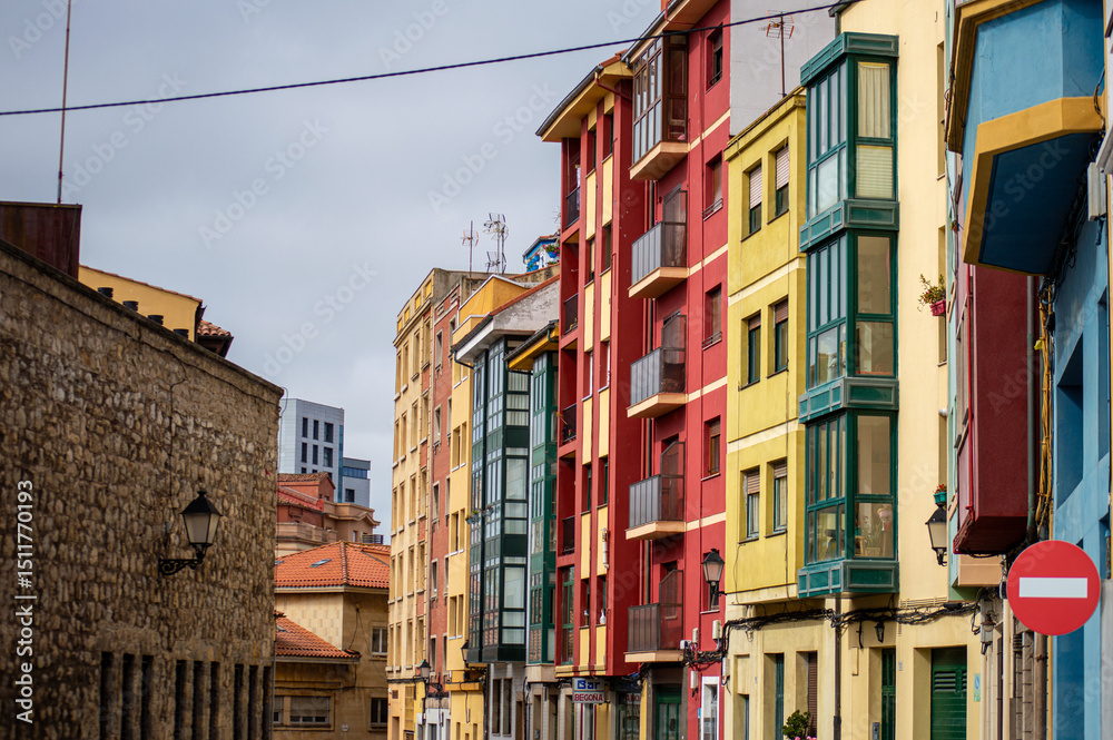 Naklejka premium Gijón is a vibrant coastal city in Asturias, Spain, known for its beaches, culture, and maritime heritage.