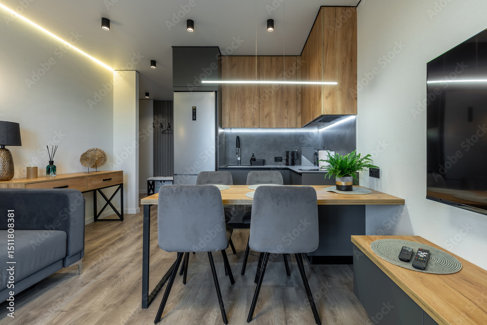 Cozy Open Kitchen and Living Room with Wooden Elements Cozy Open Kitchen and Living Room with Wooden Elements