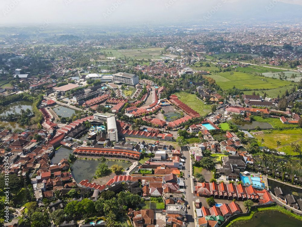 Obraz premium Aerial view of famous tourist area, Cipanas, in Garut Regency, West Java, Indonesia. Cipanas is famous as a hot spring bathing place that is naturally sourced from the mountains.