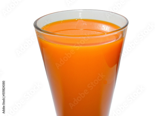 Carrot juice in a glass isolated on white