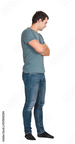 Full length side view portrait of thoughtful young man hands crossed looking down isolated on transparent background