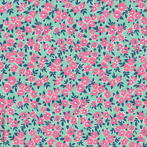 Seamless floral pattern, liberty ditsy print of mini pretty pink flowers on green field. Cute botanical fabric, textile design with small hand drawn daisy flowers, tiny leaves. Vector illustration.