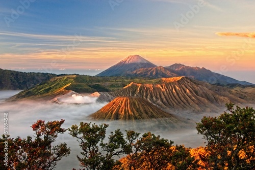 Scenic of Mount Bromo and Mount Semeru at sunrise in the Bromo Tengger Semeru National Park photo