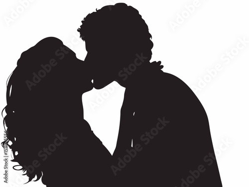 Silhouette of a couple embracing and kissing each other in a loving and intimate moment of affection