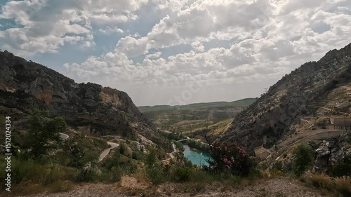 Dramatic depths and steep cliffs of Tazı Canyon, with its lush vegetation and winding river in Antalya, Turkey photo