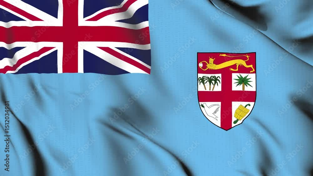 The Fiji flag waves in the wind.