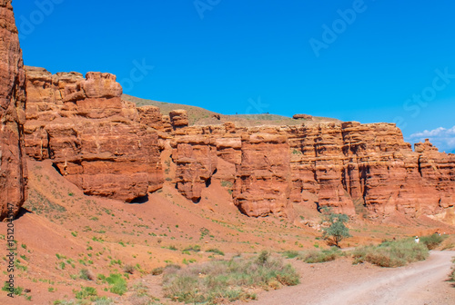 Charyn Canyon, Valley of Castles. The excellence of Kazakhstan. Panorama of natural unusual landscape. The red canyon of extraordinary beauty looks like a Martian landscape.
