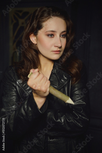 A young girl in the guise of Buffy the vampire hunter