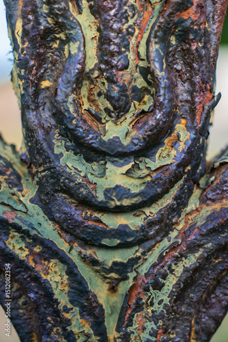 Wrought iron work with chippy paint in an old cemetery 